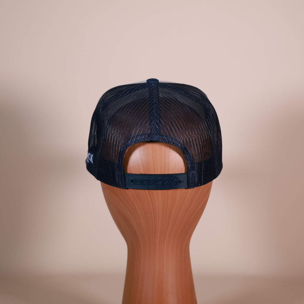 SB “Silver/Navy” Trucker Cap